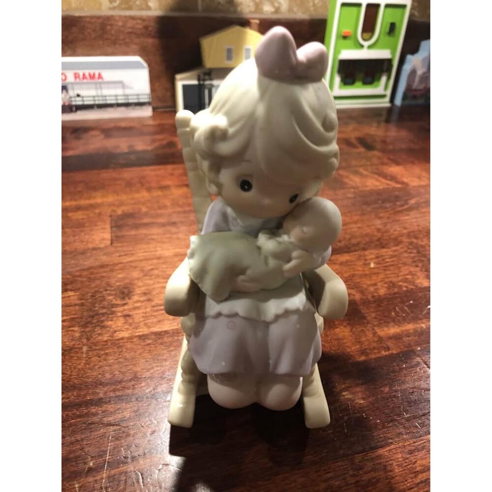 Precious Moments Love Never Leaves a Mother’s Arms Figurine